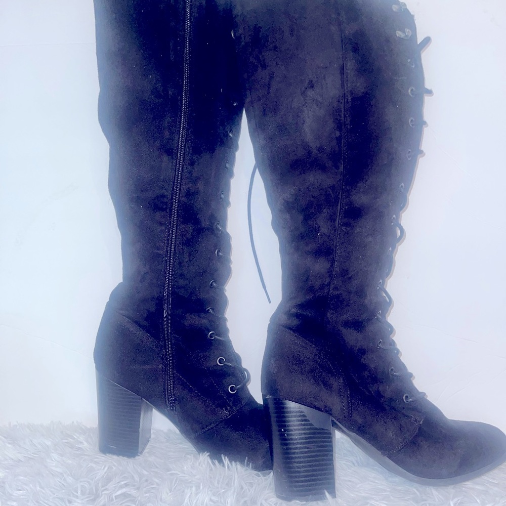 Knee length black suede lace up boot
